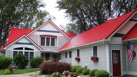 red metal roof on white house|white house with galvalume roof.